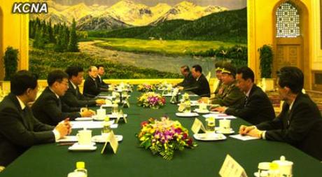 VMar Choe Ryong Hae and a senior-level DPRK delegation (R) meet with Liu Yunshan and senior CPC officials in Beijing on 23 May 2013 (Photo: KCNA)