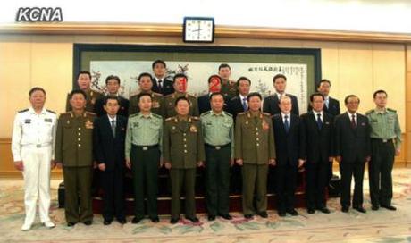 VMar Choe Ryong Hae (1)  and a senior DPRK delegation pose for a commemorative photograph with CPC Central Military Commission Vice Chairman Gen. Fan Changlong (2) and senior PLA officials in Beijing on 24 May 2013 (Photo: KCNA)