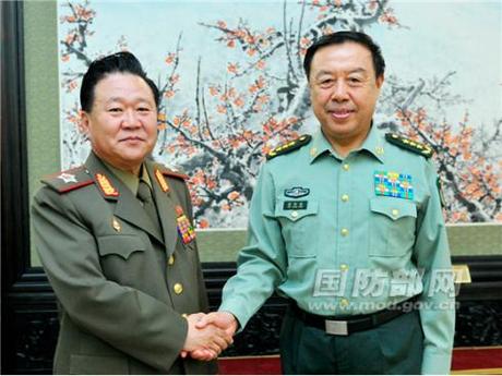 VMar Choe Ryong Hae (L), Director of the  KPA General Political Department and Vice Chairman of the KWP Central Military Commission, shakes hands with Gen. Fan Changlong (R), Vice Chairman of the CPC Central Military Commission in Beijing on 24 May 2013 (Photo: PRC MOD)
