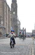 Tiny cyclist on the Royal Mile at Pedal on Parliament 2