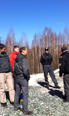 Standoff between environmentalists collecting water samples and security guards. YouTube screenshot, May 23, 2013.