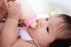 Infant Drinking Formula from Bottle