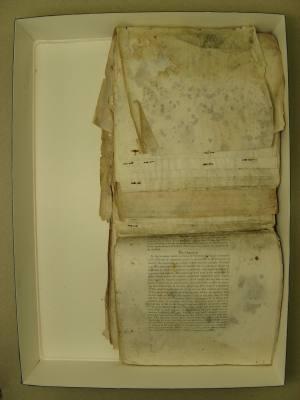 Before: Because the pages had been curled and folded for many years, the conservator also treated the pages so that they lay flat.