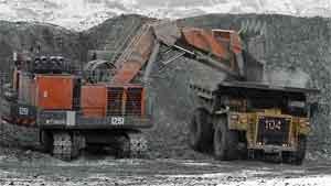 An excavator loads a dump truck at Kumtor open pit gold mine in the Tien Shan mountains, 350 kilometres southeast of the capital Bishkek near the Chinese border, March 14. 