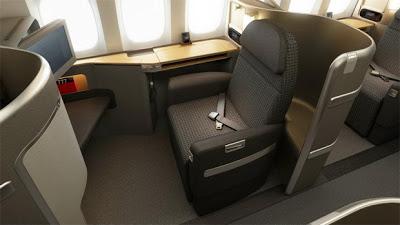 How much does it cost to upgrade from Economy to First Class