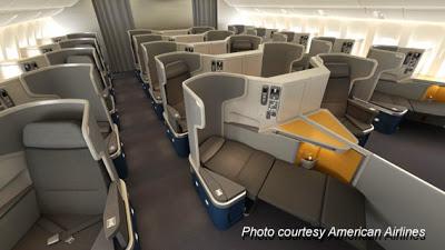 How much does it cost to upgrade from Economy to First Class