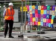 A tramworker spots the crochet tram protest