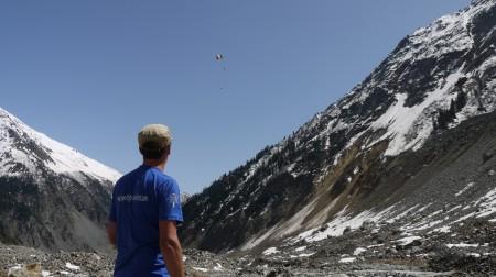 Hayden flying the kite at the Mestia glacier