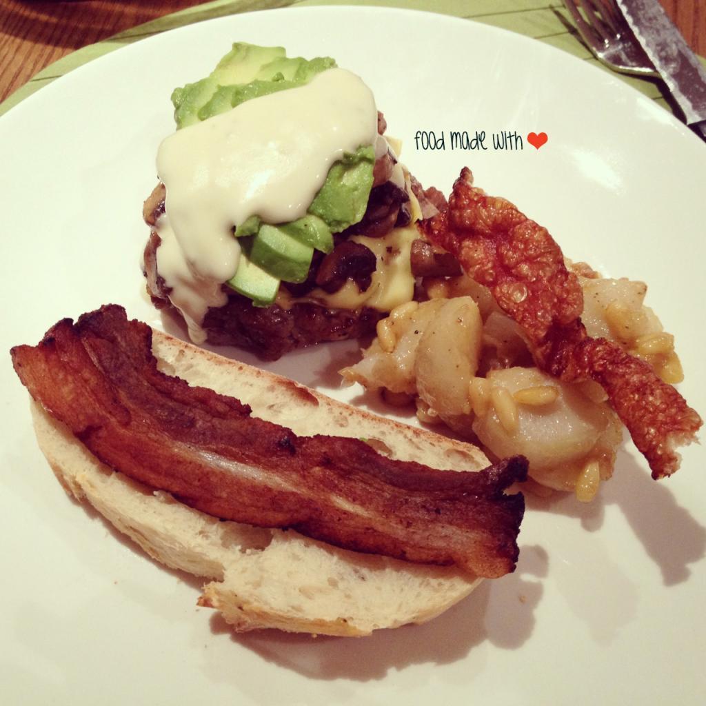 Open homemade beef patty sandwich with homemade thick-cut bacon