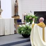 Msgr. Joseph Prior, pastor of St. John the Evangelist, incenses the eucharist.
