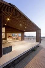 Plinth House by LAND Arquitectos