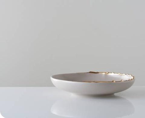 Flawed gold-plated wide bowl