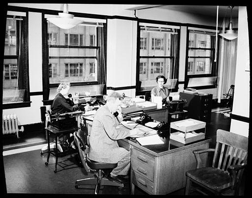 Seattle City Light employees in office, 1954