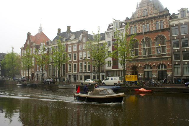 Boat on a canal in Amsterdam.