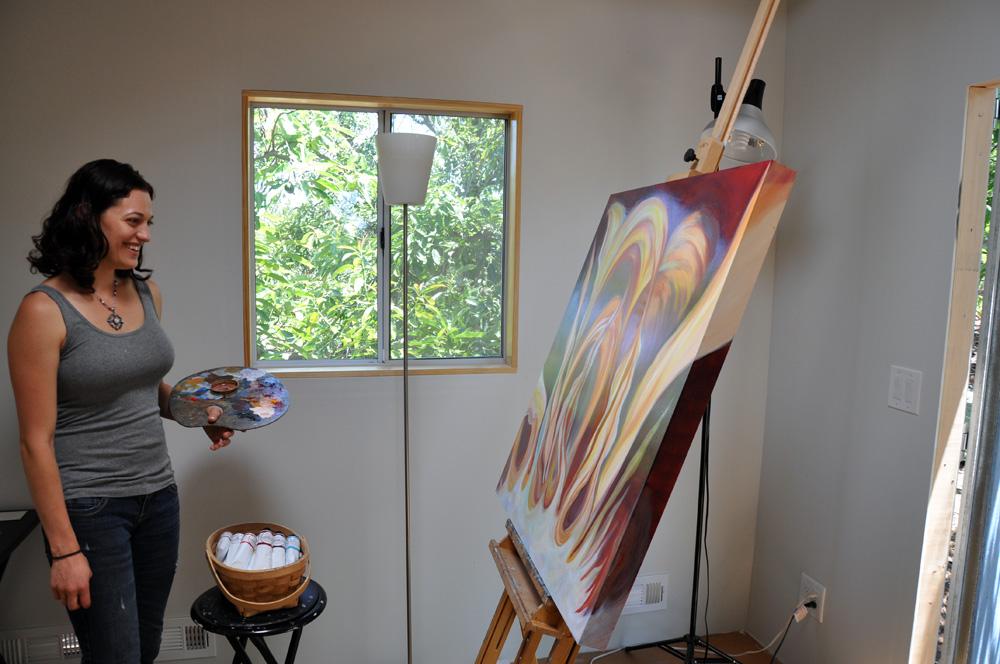 Artist Cedar Lee working in her studio.
