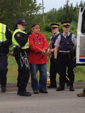A man is arrested by the RCMP this morning near Elisipogtog First Nation. Photo courtesy @1tnb
