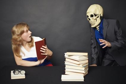 woman reading horror books