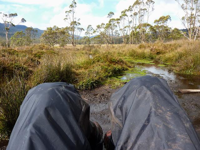 lying down in mud overland track tasmania