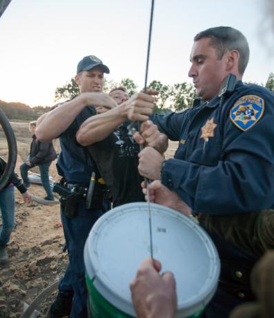 Police prevented supplies from being sent up to Red-Tailed Hawk.