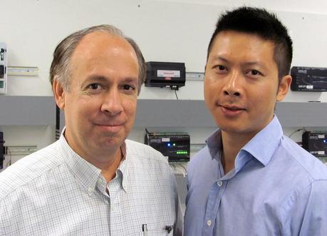 Michael Brambley and Guopeng Liu in PNNL’s Building Controls Laboratory. (Credit: PNNL)