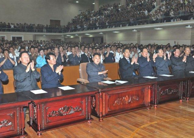 Kim Jong Un (3rd L) applauds during a performance by the Moranbong Band in Chagang Province (Photo: Rodong Sinmun).