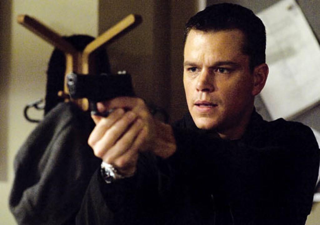 Matt Damon may seem comfortable with a gun on set, but the star of the Bourne series says that he actually hates guns because they freak him out (photo from ksl.com).