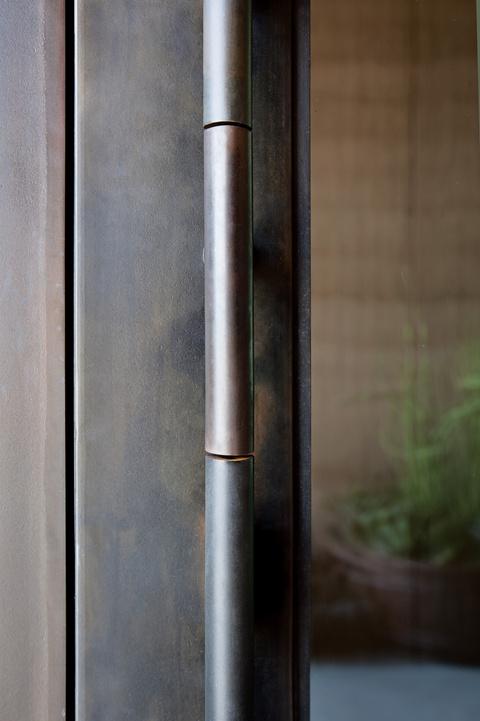 Door handle with vault-like opening mechanism.