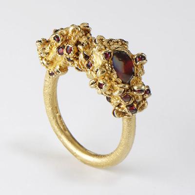 Ruth Tomlinson garnet and gold ring from hoard collection