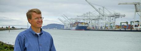 Sandia National Laboratories researcher Joe Pratt stands near the Port of Oakland, one of the west coast ports he studied to learn whether hydrogen fuel cells are a viable power source for docked ships. (Photo by Steffan Schulz)