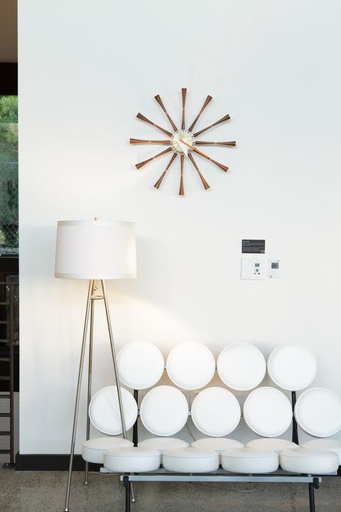 Marshmallow sofa, clock, white lamp