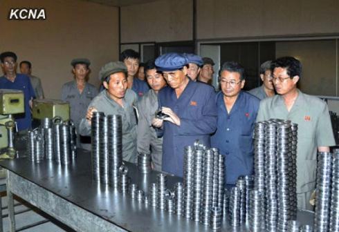 DPRK Premier Pak Pong Ju examines products of the Ryangchaek Bearings Factory (Photo: KCNA).
