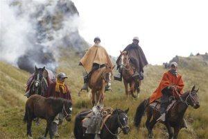 Local indigenous farmers on horseback form part of a protest against the Minas Conga gold mine, June 17, 2013