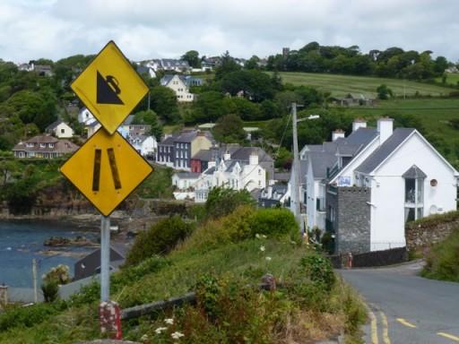 roadsign showing car going down 45 degree slope