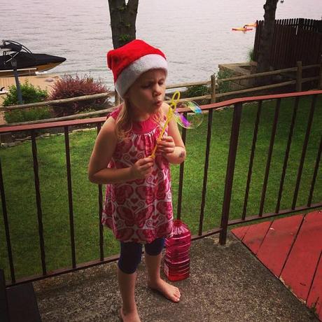 Although it's 90 degrees, Santa hats are dug out of the Christmas box, bubbles are blown