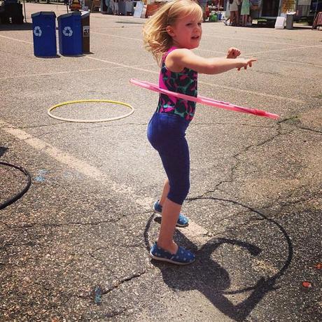 Not only did she insist on wearing her gymnastics outfit to the farmers' market, she showed us all a few tricks.