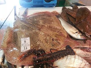 Image of fresh seafood for sale at a market in La Rochelle