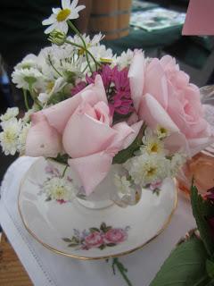 Soft pink roses in rosy bone china by Tuckshop Flowers