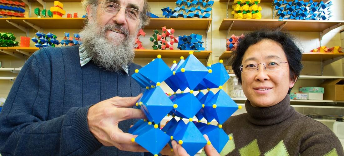 Ray Withers and Yun Liu with the chemical model of the new material. (Credit: Australian National University)