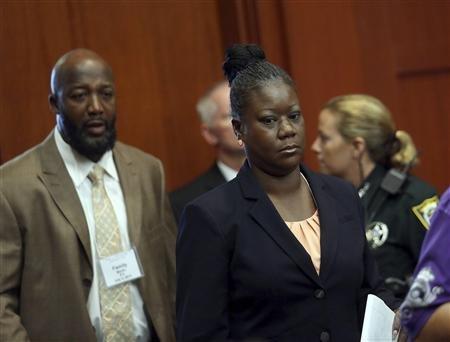 Trayvon Martin's parents Tracy Martin and Sybrina Fulton enter the courtroom after a morning recess in George Zimmerman secondnd-degree murder trial in the fatal shooting of Trayvon Martin in Seminole circuit court in Sanford