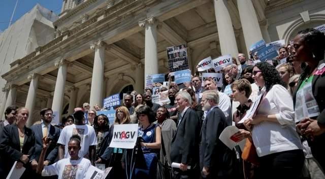 A coalition of anti-gun groups and state officials joined New Yorkers Against Gun Violence (NYAGV) to mark the 6-month anniversary of the Newtown massacre on Friday, June 14, 2013 on the steps of New York City Hall. Leah Gunn Barrett, NYAGV executive director in a press release statement said 'the New York SAFE Act gives New Yorkers some of the strongest protections against gun violence in the country,' and joined the call for Congress to follow New York's lead and pass background checks.
