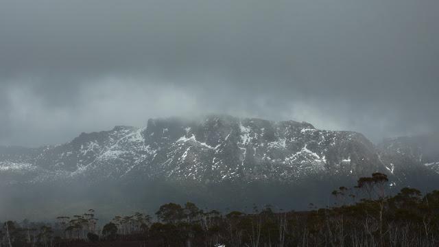 low cloud over mountains overland track