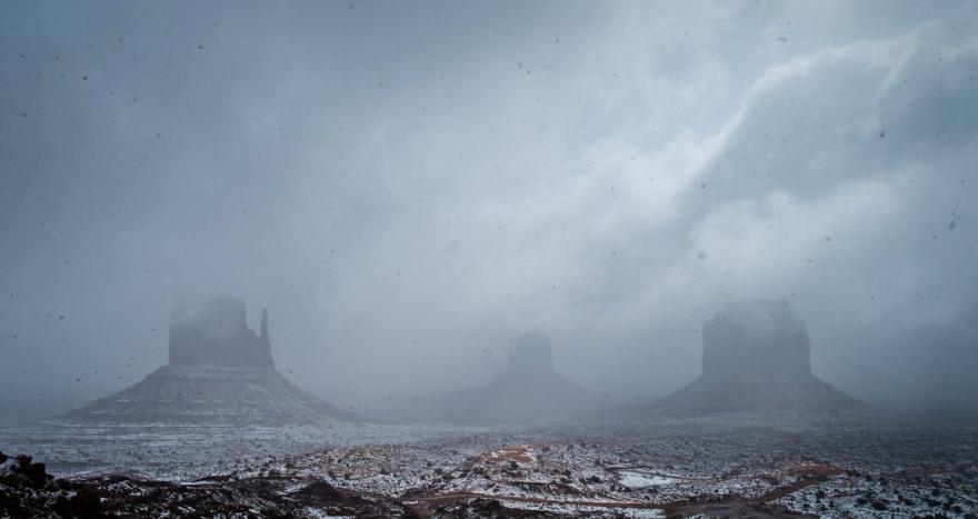 Monument Valley while a snow storm rages.