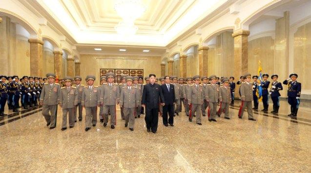 Kim Jong Un (6th L) visits the Ku'msusan Palace of the Sun with senior DPRK officials on 8 July 2013, the 19th anniversary of the death of his paternal grandfather, late DPRK founder and president Kim Il Sung (Photo: Rodong Sinmun).