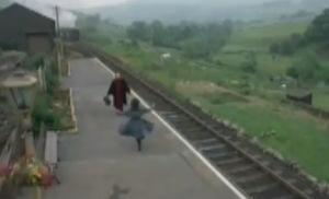 Roberta runs toward her returning father at the end of the 1970 screen adaptation of The Railway Children