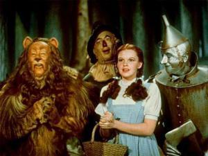 L-R ?, ?, Judy Garland & ? in MGMs 1939 screen verison 'The Wizard of Oz'.