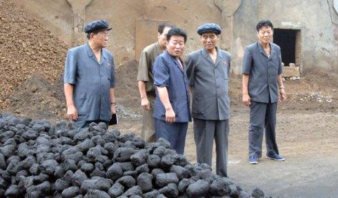 DPRK Premier Pak Pong Ju (2nd R) is briefed about production at the briquette section of the Hwanghae Iron and Steel Complex in Songnim, North Hwanghae Province (Photo: Rodong Sinmun).