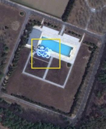 A water slide at the outdoor swimming pool at the Ryo'ngso'ng residential compound which may have been used in the design of the Munsu Wading Pool.  As of 2012 the outdoor swimming pool and water slide have been removed (Photo: Digital Globe).