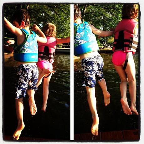 July 4th calls for some serious cliff jumping.  Or jumping off the edge of the dock which is a few inches off the water.  But it kind of feels the same when you're 4 and 5.