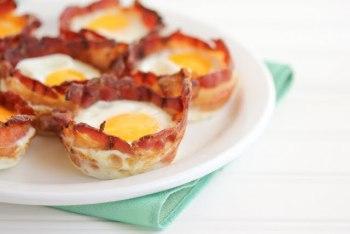 Bacon cups are awesome and there are plenty of variations. http://kirbiecravings.com/2011/09/bacon-egg-breakfast-cups.html