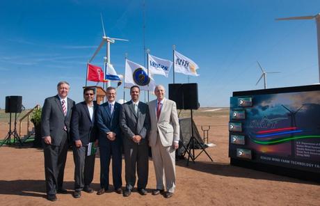 Texas Tech chancellor Kent Hance, far right, and presdient M. Duane Nellis, far left, post with officials from the Department of Energy, Sandia National Laboratories and Vestas. (Credit: Texas Tech University)